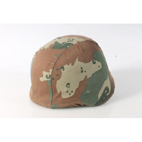 224 - British army helmet with label 'S.A.P.H.I. (PTY) LTD Rosslyn' label penned 'Jimmy', cloth camouflage... 