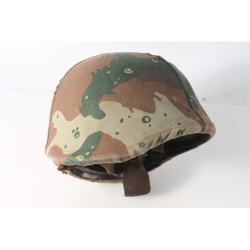 224 - British army helmet with label 'S.A.P.H.I. (PTY) LTD Rosslyn' label penned 'Jimmy', cloth camouflage... 