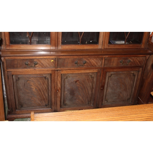 882 - Victorian mahogany astragal glazed cabinet bookcase, the three glazed doors above three frieze drawe... 