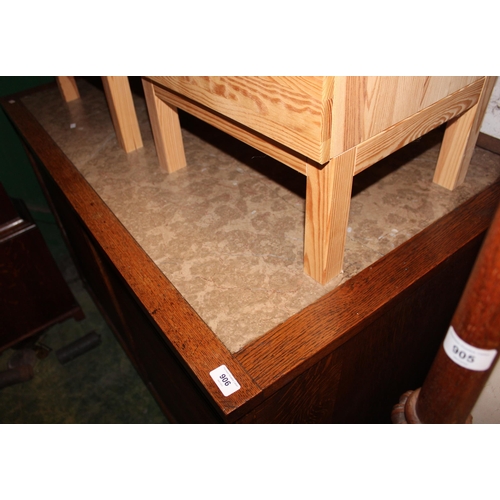 906 - Oak marble topped tambour fronted cabinet, 122cm wide x 77cm deep x 92cm tall.