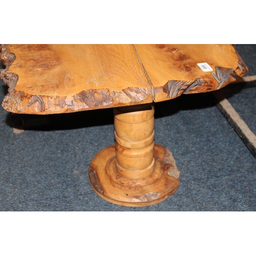 955 - Tim Stead style walnut coffee table on turned supports.