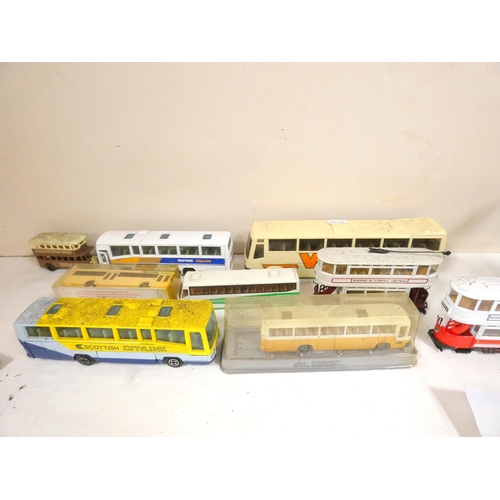 408 - Collection of diecast buses and trams.