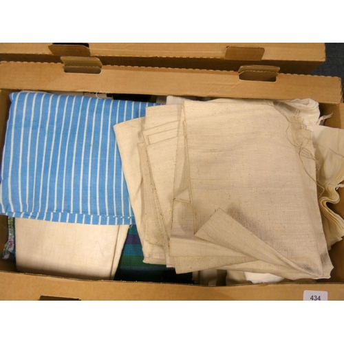 434 - Two boxes of quilt making fabric.