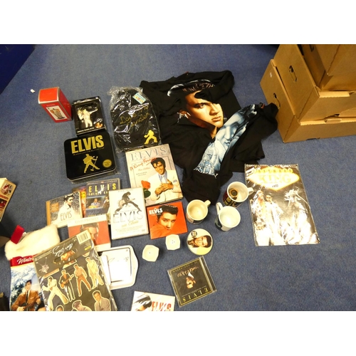 516 - Large box of Elvis memorabilia including records, t-shirts, mugs etc.