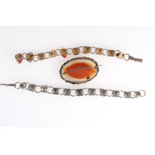 704 - Yellow metal framed Scottish hardstone set brooch and two Scottish stone set bracelets.