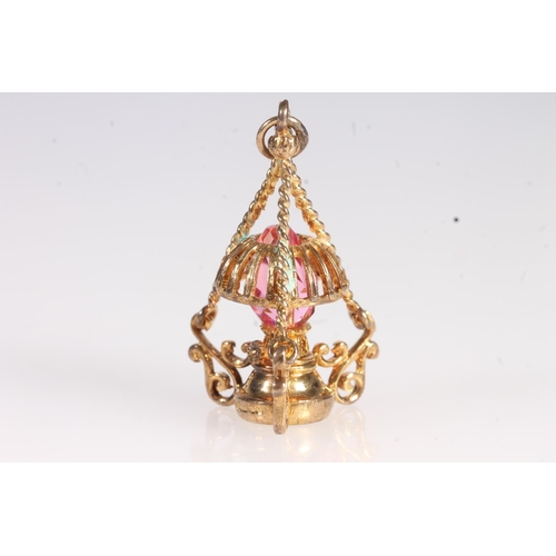 710 - 9ct gold pink stone set pendant in the form of a lantern, 4.9g.