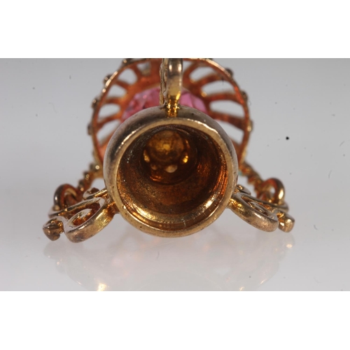 710 - 9ct gold pink stone set pendant in the form of a lantern, 4.9g.