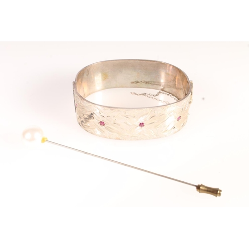 711 - Silver pink stone set ladies snap shut bangle, 41g, two dress watches and a hat pin.