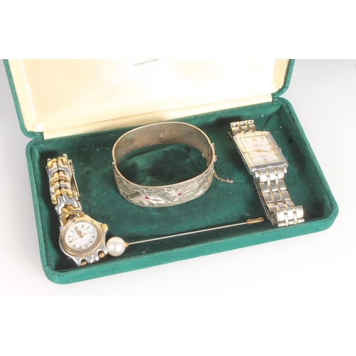 711 - Silver pink stone set ladies snap shut bangle, 41g, two dress watches and a hat pin.