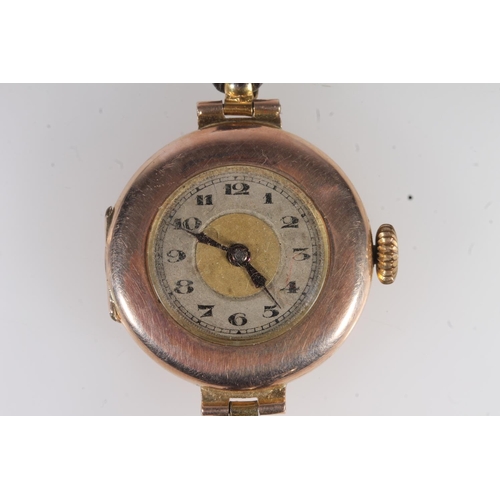 724 - 9ct gold cased ladies wristwatch on antique leather strap.