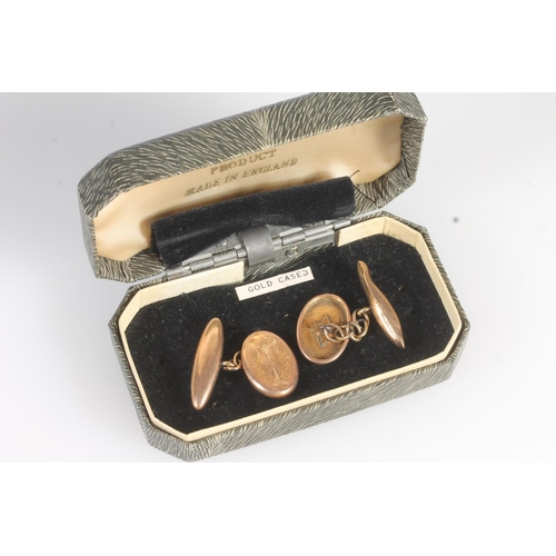 728 - Pair of 9ct gold monogrammed cufflinks, 4.1g.