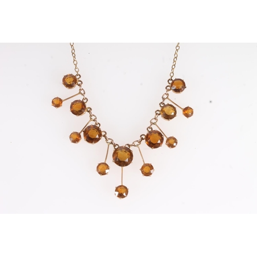 745 - 9ct gold faceted citrine set drop necklace with barrel clasp, 8.9g.