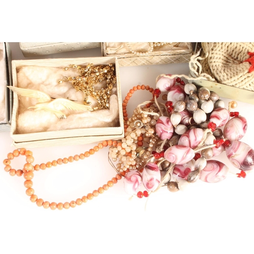 752 - Box containing costume jewellery, a coral bead necklace, brooches etc.