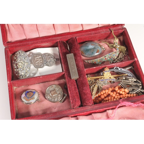 753 - Small leather case containing a silver ARP brooch, silver brooches, a coral necklace, etc.