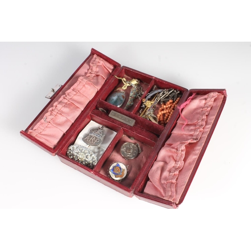 753 - Small leather case containing a silver ARP brooch, silver brooches, a coral necklace, etc.