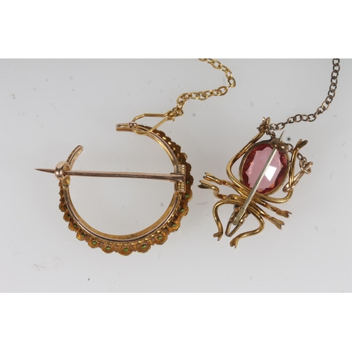 769 - Victorian yellow metal pearl and green stone crescent moon brooch, 4.9g and a pink stone set spider ... 