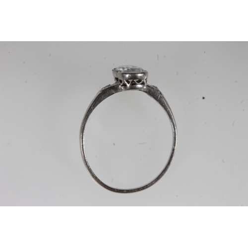 777 - White metal two stone dress ring (not diamonds).