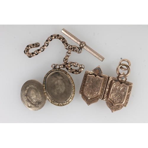 779 - Victorian yellow metal twin picture locket and another with attached yellow metal chain.