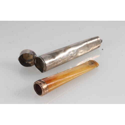 846 - Silver cased yellow metal mounted amber cheroot holder. 