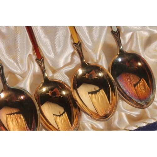 849 - Cased set of six Danish sterling silver and enamelled teaspoons, 61g.