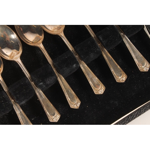 851 - Cased set of six sterling silver teaspoons, Francis Howard, Sheffield, 51g and a silver backed brush... 