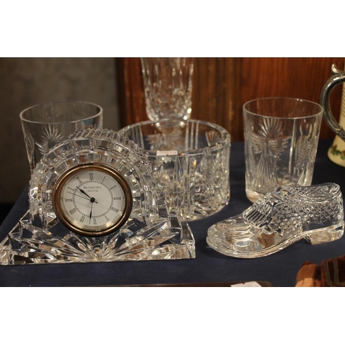 35 - Waterford Crystal glass mantel clock and beakers, and other glassware.