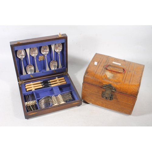 47 - Vintage tin and a canteen of cutlery.