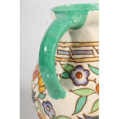 5 - Charlotte Rhead Bursley Ware tubelined pottery jug, 21cm high.