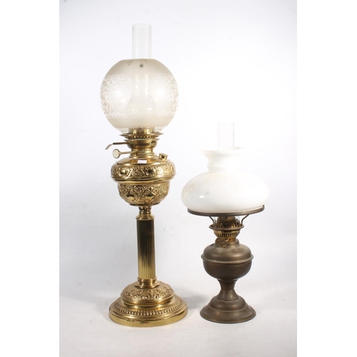 53 - Two oil lamps.