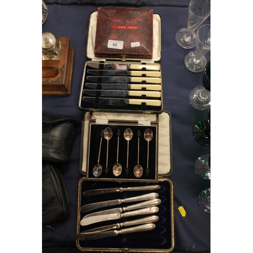 60 - Silver-plated cutlery sets to include butter knives, teaspoons, etc.