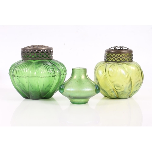 63 - Seven early 20th century Austrian Loetz iridescent glass vases.