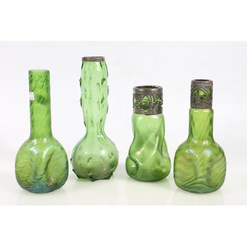 63 - Seven early 20th century Austrian Loetz iridescent glass vases.