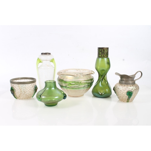 65 - Six early 20th century Austrian Loetz iridescent glass vases and jugs.