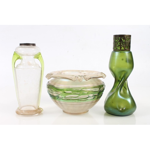 65 - Six early 20th century Austrian Loetz iridescent glass vases and jugs.