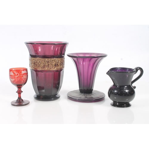 67 - Victorian to early 20th century amethyst glassware.  (4)