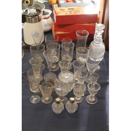 69 - Victorian and later glassware to include a decanter, rummers, etc.