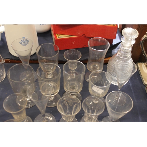 69 - Victorian and later glassware to include a decanter, rummers, etc.