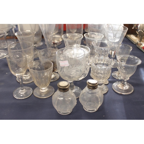 69 - Victorian and later glassware to include a decanter, rummers, etc.