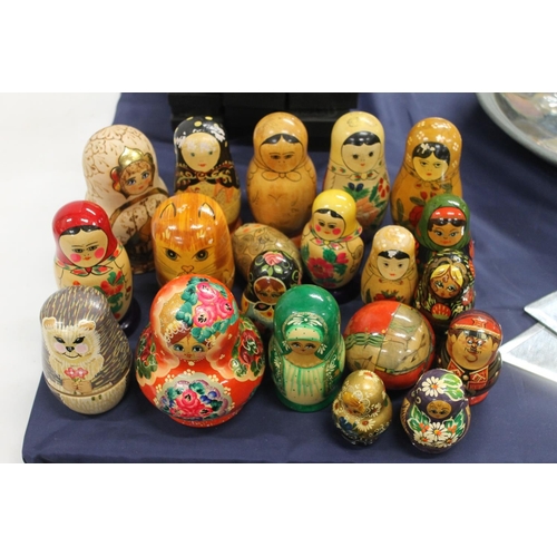 76 - Russian Matryoshka nesting dolls to include hedgehogs, cats and traditional Babushka.