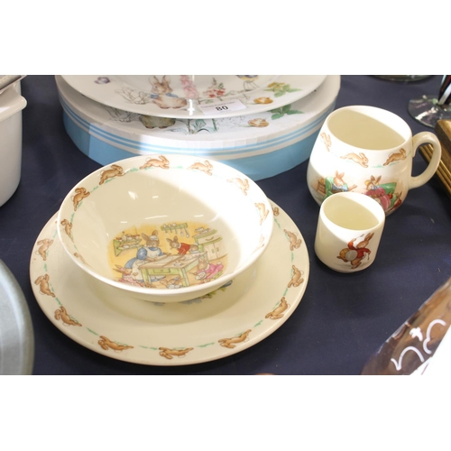 80 - Royal Doulton Bunnykins breakfast set, and a Beatrix Potter two tier cakestand, boxed.