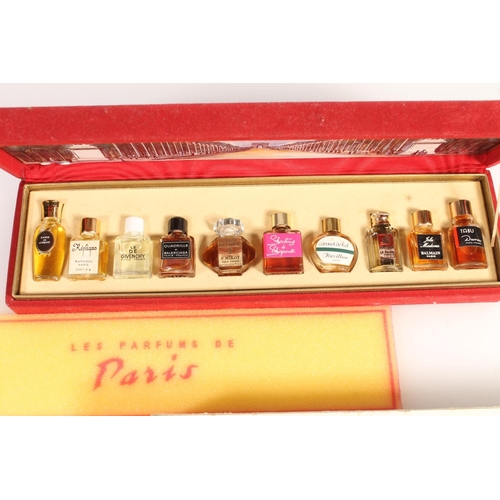 814E - Les Parfums De Paris boxed ten bottle set & another Marquay of Paris. (2)