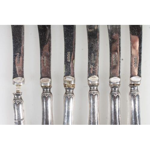 819 - Sterling silver napkin ring, silver spoon and  six silver handled knives (1 a/f).