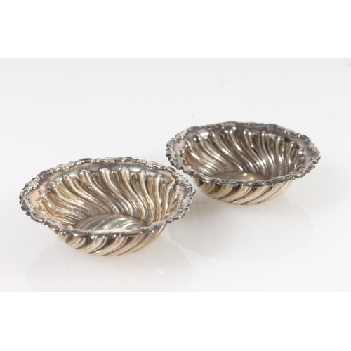 861 - Sterling silver shell shaped side dish, London, 71g, a silver spoon, William Rawlings Sobey, 1857, L... 