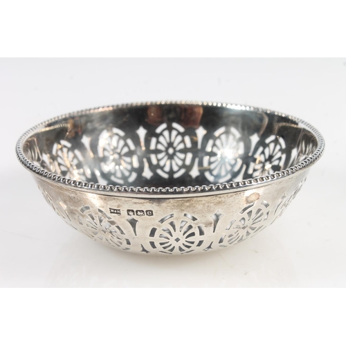 870 - Pair of sterling silver pierced bon-bon dishes or bowls, Walker & Hall, Sheffield, 76g.