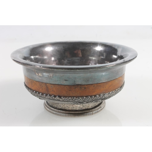 872 - White metal and wooden Indian style bowl, two miniature silver photo frames, a miniature silver enve... 