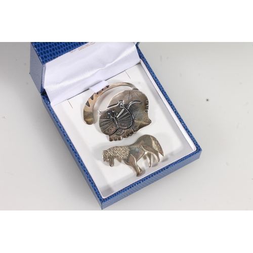 873 - Sterling silver cat brooch and a similar silver horse brooch.