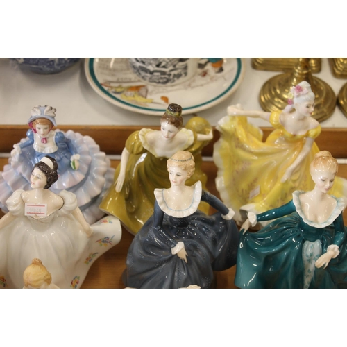 186 - Nine Royal Doulton figurines to include Sweet Seventeen, Kirsty, etc.