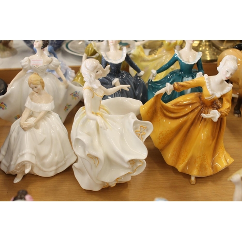 186 - Nine Royal Doulton figurines to include Sweet Seventeen, Kirsty, etc.