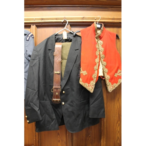 208 - Military scarlet red waistcoat with bullion wire trim, a British Army black jacket and two pairs of ... 