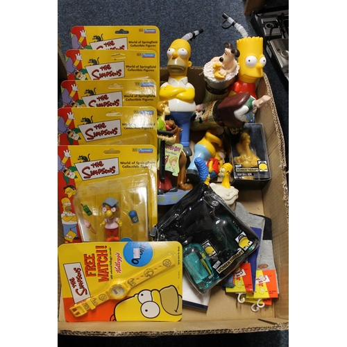 231 - The Simpsons related collectibles to include Playmates figurines carded, socks, bathtub accessories,... 